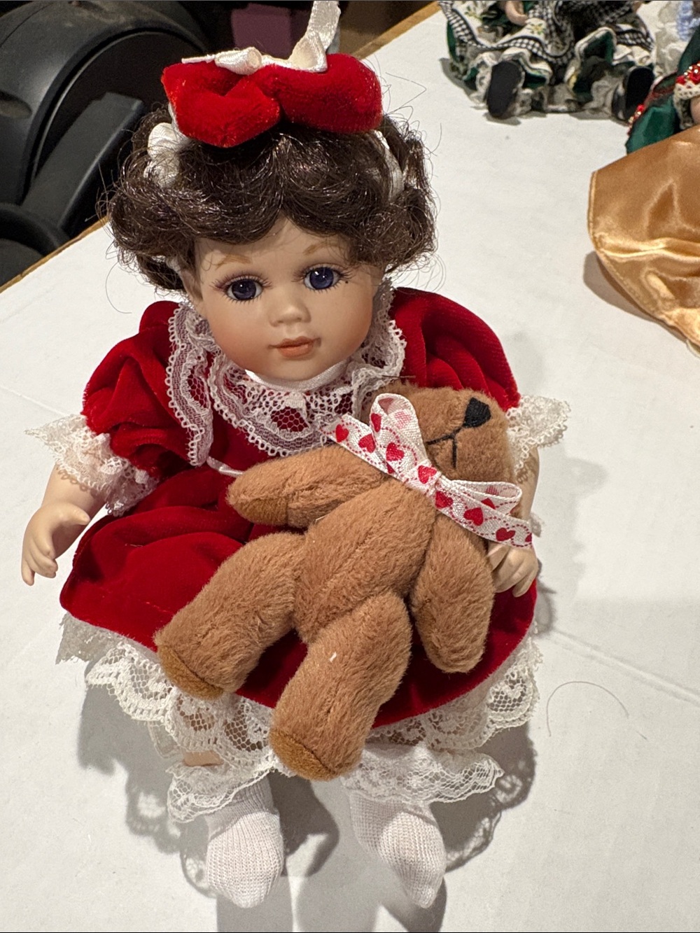 Porcelain Doll in Red Velvet Dress with Teddy